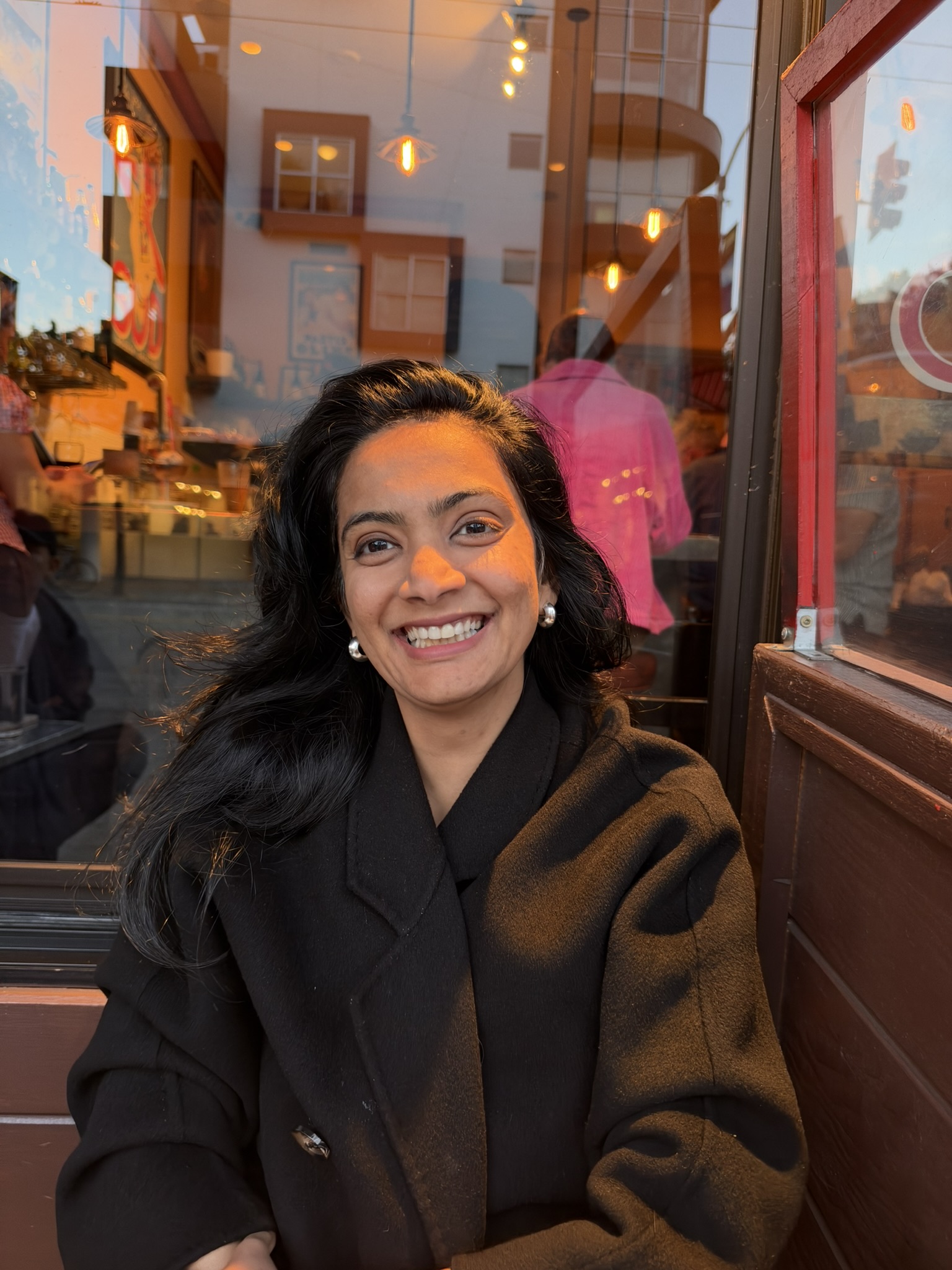 Priyanka Parikh smiling in warm evening light